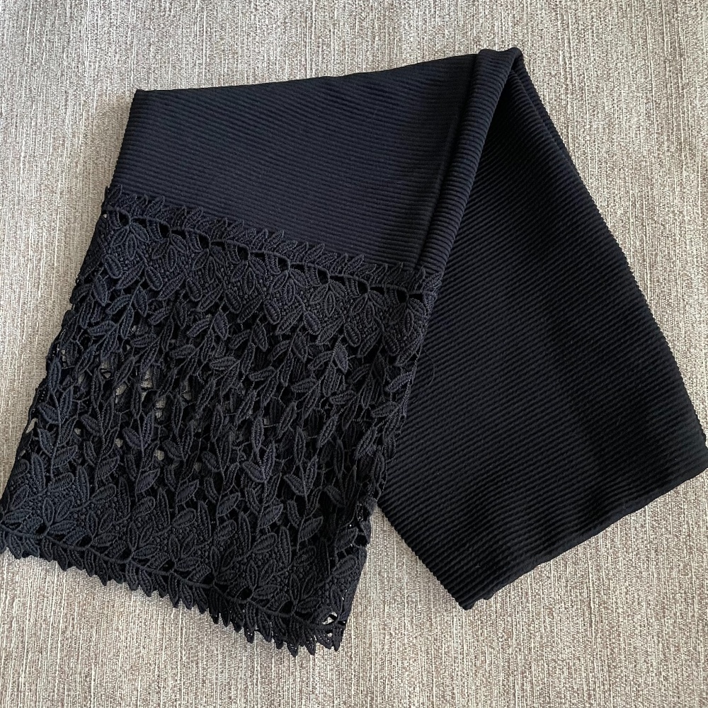 High-waisted, black skirt with Gorgeous Detailing